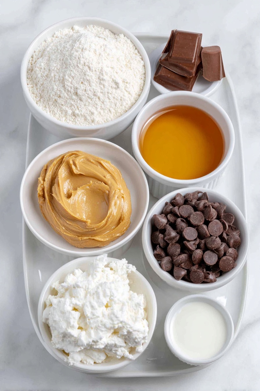 Protein Cookie Dough Bites, healthy protein snacks, no-bake protein treats, high-protein dessert ideas, easy healthy snack recipes - Flat lay of a small white ceramic bowl of fine almond flour, a small white ceramic bowl of vanilla protein powder, a smooth dollop of creamy peanut butter on a simple white ceramic plate, a small white ceramic bowl filled with amber maple syrup, a small white ceramic bowl of creamy non-dairy milk, a few drops of vanilla extract in a tiny white ceramic bowl, and a small white ceramic bowl heaped with glossy dark chocolate chips, all arranged symmetrically and naturally fresh, placed on a clean white marble surface, soft natural light, photo taken with an iPhone, professional food photography style, fresh ingredients, white ceramic bowls, no bottles, no duplicates, no utensils, no packaging --ar 2:3 --v 7 --p m7354615311229779997