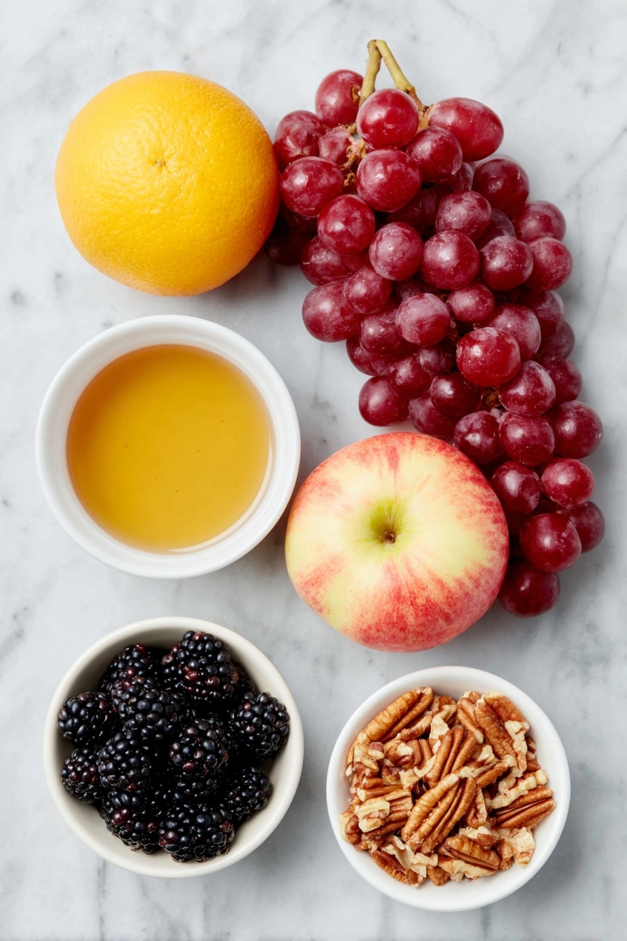Fall Fruit Salad with Maple Cinnamon Dressing, autumn fruit salad, healthy fall fruit salad recipe, cinnamon maple salad, seasonal fruit salad - Flat lay of a whole bright orange, a small white ceramic bowl filled with amber maple syrup, a small white ceramic bowl containing fine ground cinnamon powder, a bunch of fresh red seedless grapes, a cluster of plump blackberries, a small white ceramic bowl with chopped pecans, two whole crisp sweet apples (one red and one with a blush yellow tone) placed beside each other, all arranged in perfect symmetry on a clean white marble surface, soft natural light, photo taken with an iPhone, professional food photography style, fresh ingredients, white ceramic bowls, no bottles, no duplicates, no utensils, no packaging --ar 2:3 --v 7 --p awthu7i m7354615311229779997