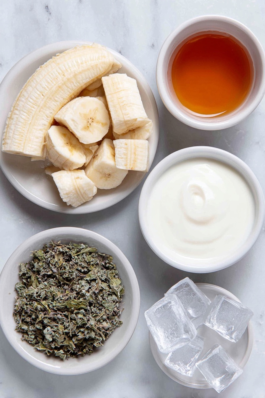 Banana Chamomile Tea Smoothie, calming smoothie with banana and chamomile, healthy banana chamomile drink, soothing fruit smoothie, floral tea banana smoothie - Flat lay of a peeled ripe banana broken into chunks, a small white bowl of brewed chamomile tea, a small white bowl of honey, a small white bowl of fresh milk, a few clear ice cubes arranged neatly, and a small white bowl with dried chamomile leaves for garnish, all placed in perfect symmetry on simple white ceramic dishes, placed on a clean white marble surface, soft natural light, photo taken with an iPhone, professional food photography style, fresh ingredients, white ceramic bowls, no bottles, no duplicates, no utensils, no packaging --ar 2:3 --v 7 --p awthu7i m7354615311229779997