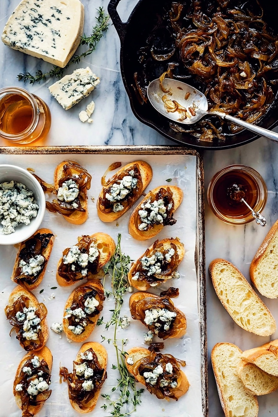 Caramelized Onion and Blue Cheese Crostini, caramelized onion crostini with blue cheese, easy appetizer recipes, sophisticated finger foods, gourmet snack ideas - There is a white baking tray with twelve toasted slices of bread arranged in three rows of four. Each slice has a layer of dark caramelized onions topped with crumbled creamy blue cheese that is white with blue veins. To the right of the tray, there are some plain slices of bread showing a soft, light inside. Above the tray, a black cast iron pan holds more caramelized onions with a silver fork resting inside. On the left side, a wedge of blue cheese and sprigs of fresh herbs sit on the white marbled surface. Below this, a small white bowl contains more blue cheese crumbles, next to a glass jar of dark honey with a spoon inside. Photo taken with an iphone --ar 2:3 --v 7