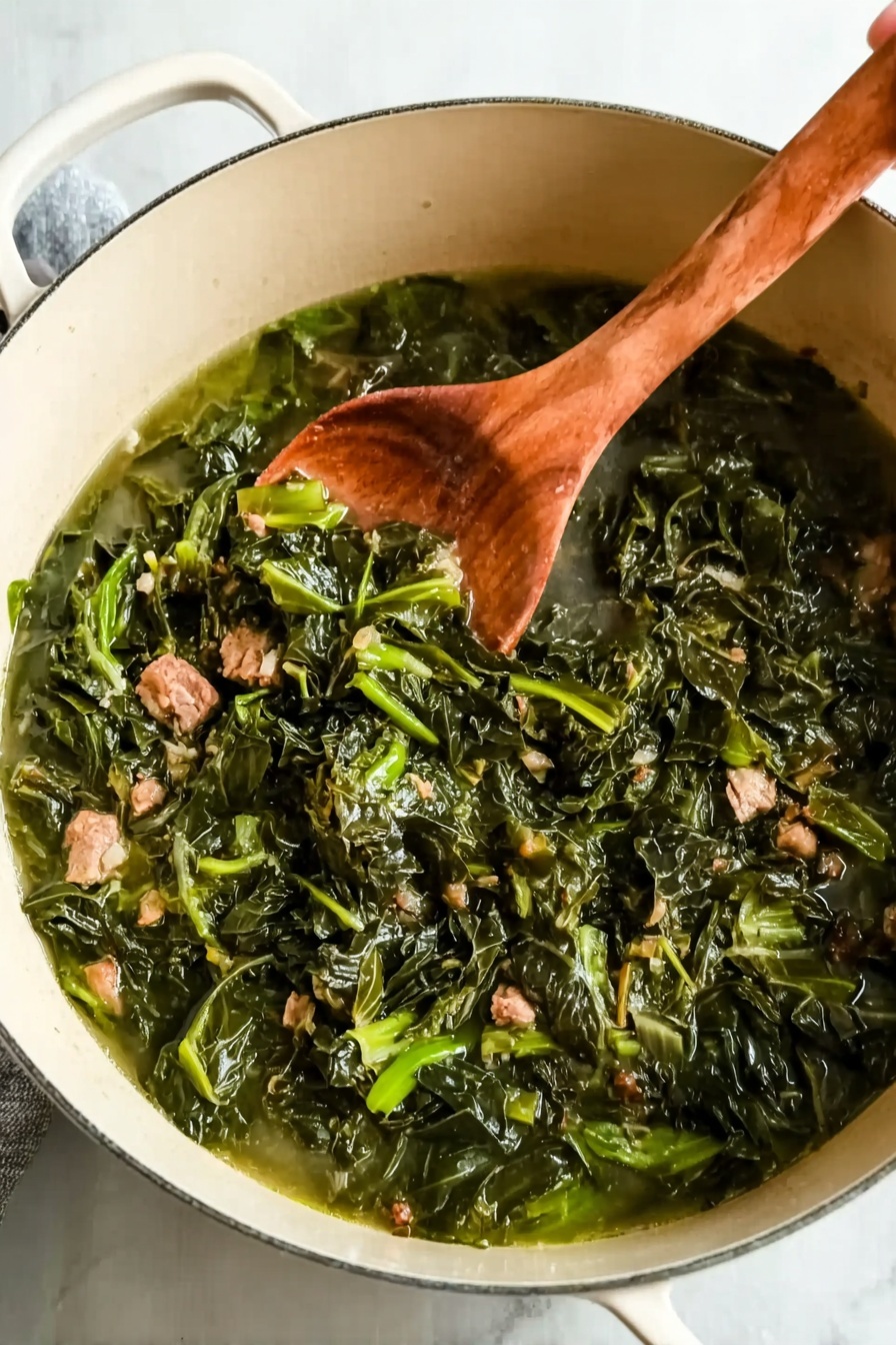 Savory Cajun Collard Greens, Cajun collard greens recipe, Southern collard greens, smoky collard greens, Cajun greens side dish - A white pot filled with cooked leafy greens that are dark green and slightly shiny, mixed with small pieces of light brown meat. The greens look soft and moist, sitting in a clear, light green broth with small bits floating in it. A wooden spoon rests inside the pot, with a woman's hand holding it from the right side. The pot is placed on a white marbled surface. photo taken with an iphone --ar 2:3 --v 7