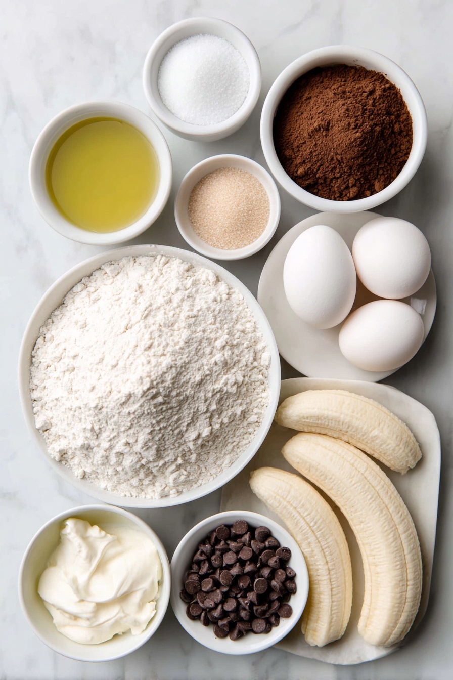 Chocolate Espresso Banana Bread, banana bread with espresso and cocoa, easy chocolate banana loaf, moist banana bread recipe, coffee-flavored banana bread - Flat lay of a small mound of all purpose flour, a small mound of cocoa powder, a teaspoon of fine espresso powder, a teaspoon of kosher salt, a teaspoon of baking soda, a small white bowl of golden olive oil, a small white bowl filled with light brown granulated sugar and another small white bowl with white granulated sugar, two whole uncracked brown eggs with clean shells, a small white bowl of sour cream, a small plate with three ripe peeled bananas, a small white bowl with dark chocolate chips, another small white bowl with semi sweet chocolate chips, two long thin banana slices on a simple white ceramic plate arranged neatly beside the bowls, all ingredients arranged symmetrically and proportionally, placed on a clean white marble surface, soft natural light, photo taken with an iPhone, professional food photography style, fresh ingredients, white ceramic bowls, no bottles, no duplicates, no utensils, no packaging --ar 2:3 --v 7 --p m7354615311229779997